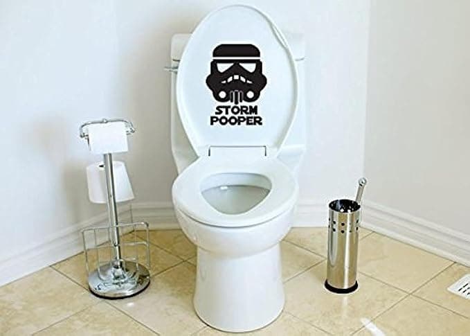 Vinyl decal that reads “Storm Pooper” with a Stormtrooper helmet above a toilet seat—adding galactic giggles to any bathroom setup.