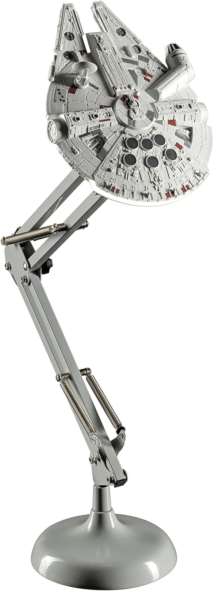 Millennium Falcon desk lamp hovering over a workspace, casting a heroic glow like it's about to jump to lightspeed during your late-night emails.