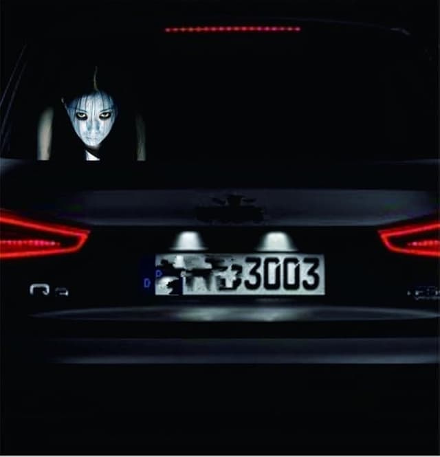 Reflective car window decal of a scary ghost woman with glowing eyes—perfect for pranks or haunting your morning commute.