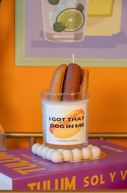 “I Got That Dog In Me” candle with bold label and citrus balsam scent—funny and fierce gift for alpha aromatherapy fans.
