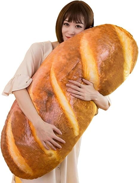 Oversized plush pillow shaped like a buttery slice of bread that’s begging for a cuddle