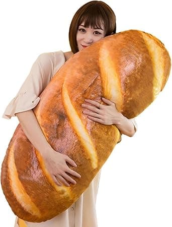 Oversized plush pillow shaped like a buttery slice of bread that’s begging for a cuddle