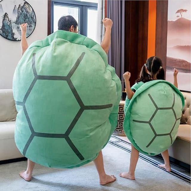Giant plush wearable turtle shell pillow—funny and cozy cosplay cushion for lounging, cuddling, or turtle-ing in public.