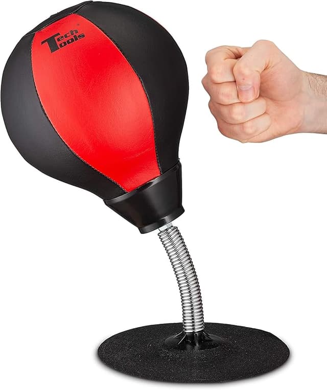 Tech Tools desktop punching bag with suction base—funny office gadget for stress relief and low-key workplace aggression.