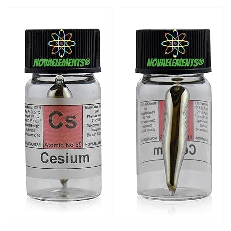 A sealed glass ampoule containing 0.5 grams of pure cesium metal, labeled and preserved in argon gas for scientific or collectible display.